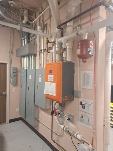 Intellihot tankless water heater installation from Delval Equipment