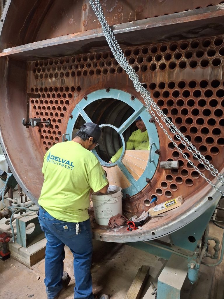 Delval Service Technicians doing work on industrial boiler